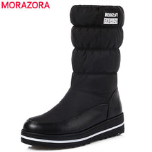 Load image into Gallery viewer, MORAZORA Plus size 35-44 new snow boots women warm cotton down shoes waterproof boots fur platform mid calf boots black